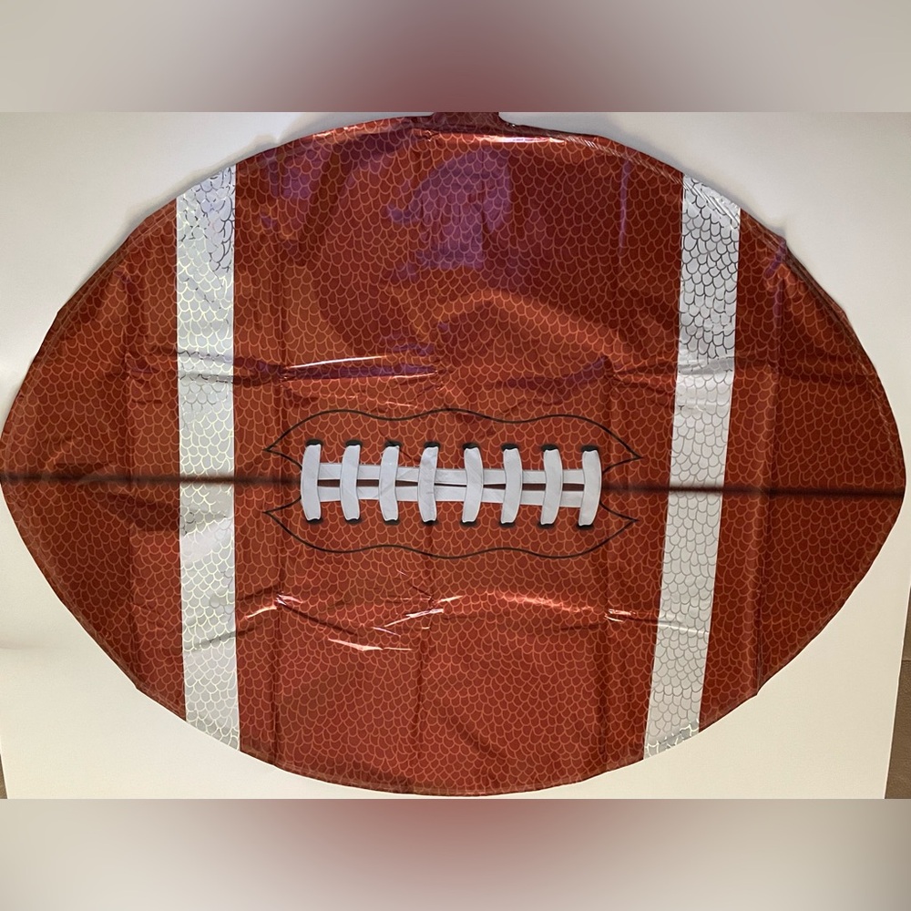 Football Shaped Inflatable 18 inches. 12 Balloons included
Great Party decor